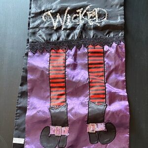 Embroidered 'Wicked' Witch Leg Wall Hanging - Purple & Red table runner.